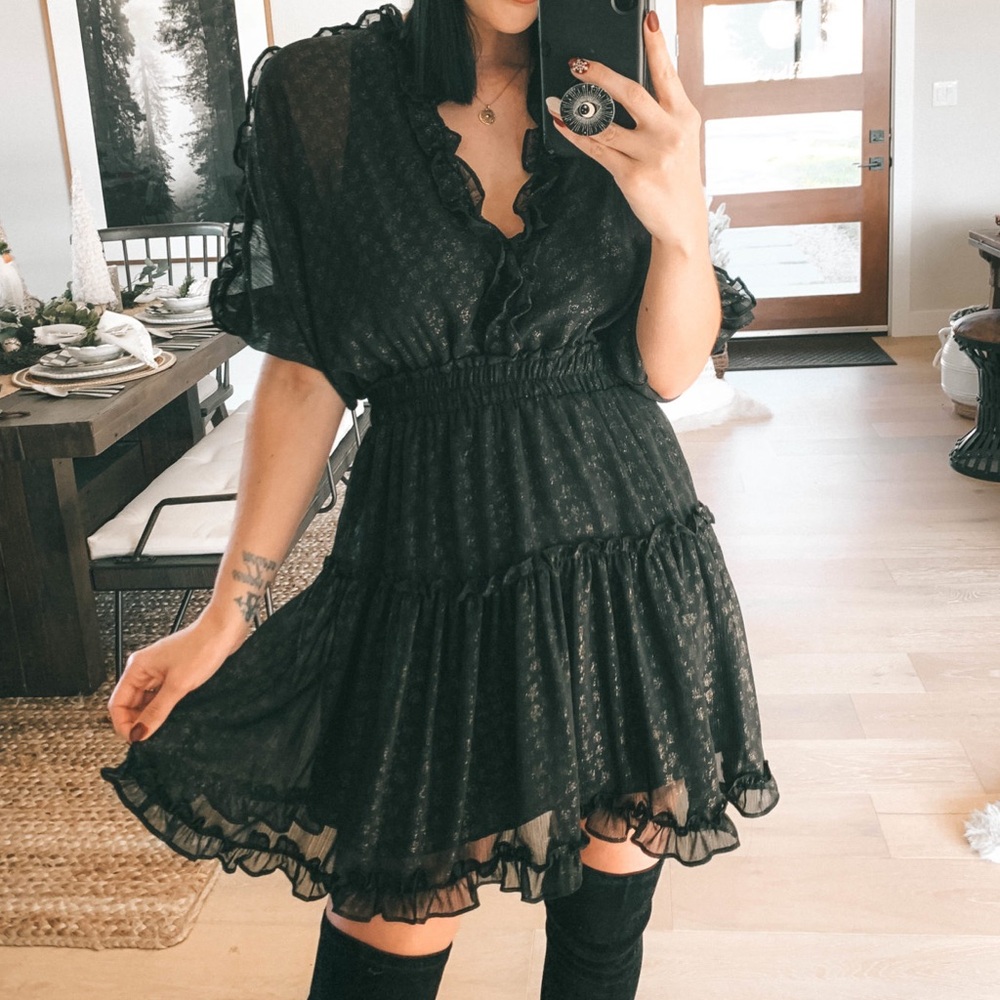 Black frilly dress. LoveStitch size small. Worn twice